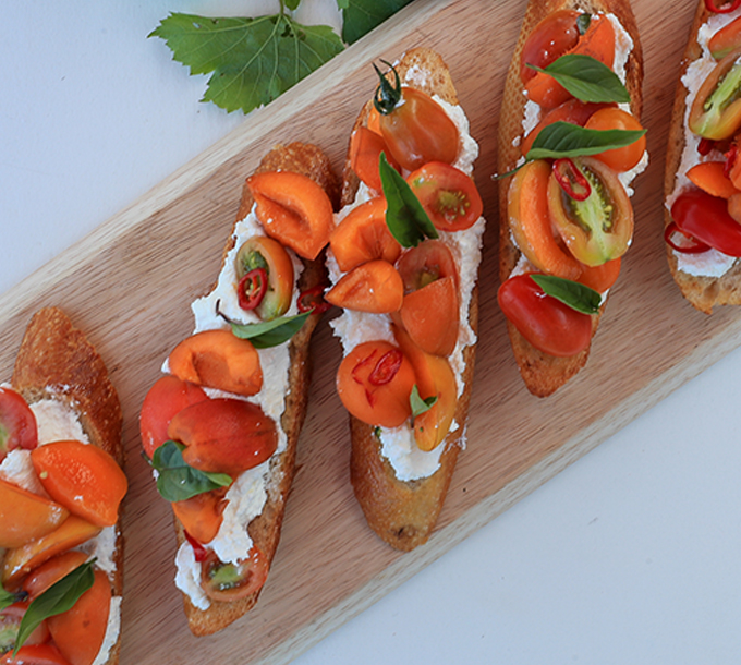 Ricotta, apricot and tomato toasts