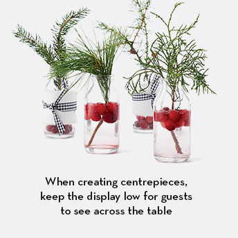 When setting flowers, keep the display low for guests to see across the table.